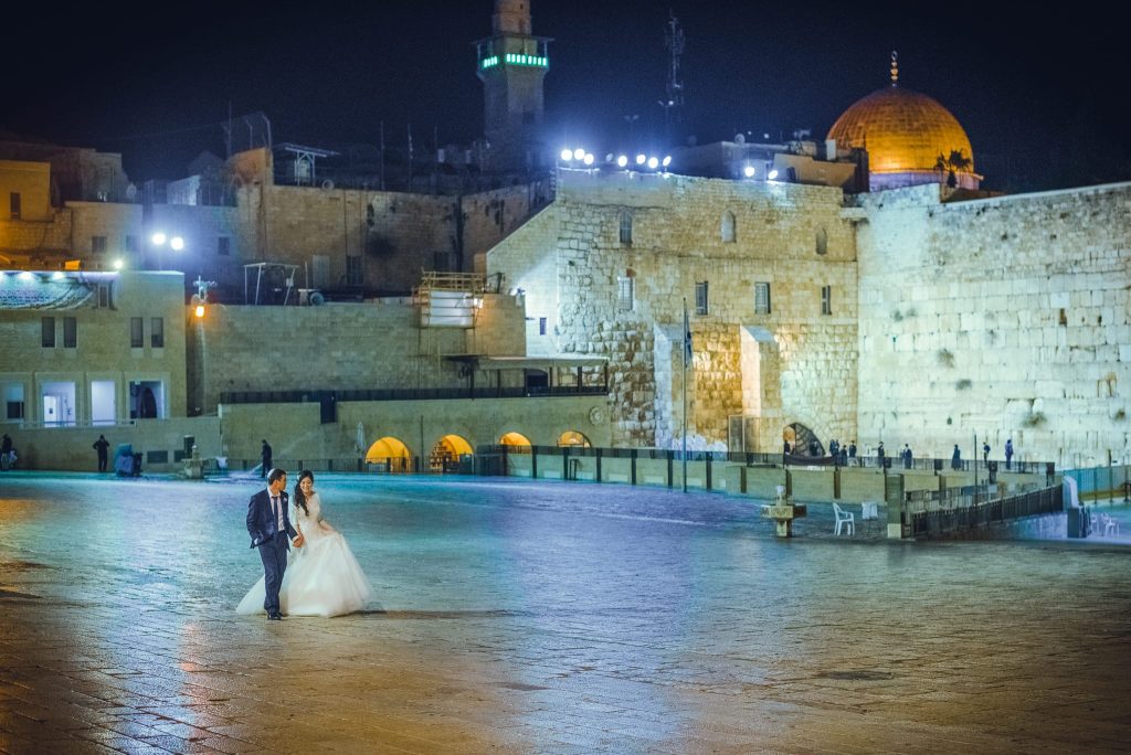Breathtaking Jerusalem perspective of a luxury wedding ceremony captured as iconic wedding photography by Arnold Szmerling, manifesting the enduring soul of the couple for the Visual Life Collection.