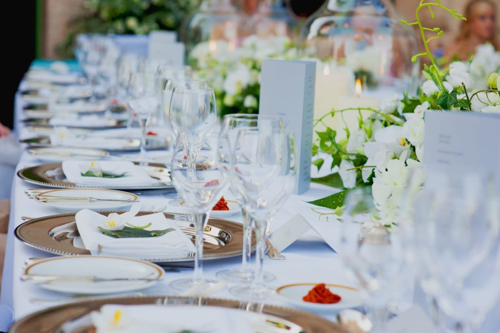 Close up table setting view of exclusive wedding reception in the outdoor courtyard captured as a fine art manifestation by Arnold Szmerling during an exclusive collaboration with the King David Jerusalem for the Visual Life Collection.