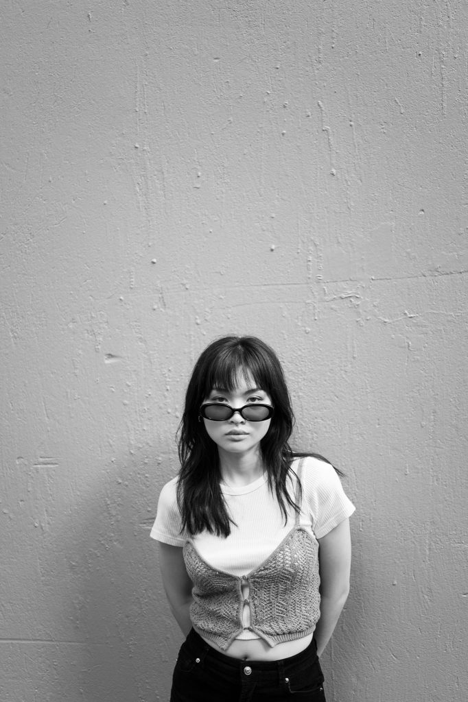 Glasses dropped slightly in Black and White by model Kobowonderland, captured with the Leica Q3 43, a work of passion by Arnold Szmerling for the Visual Life Collection focusing on lifestyle legacy portraiture.