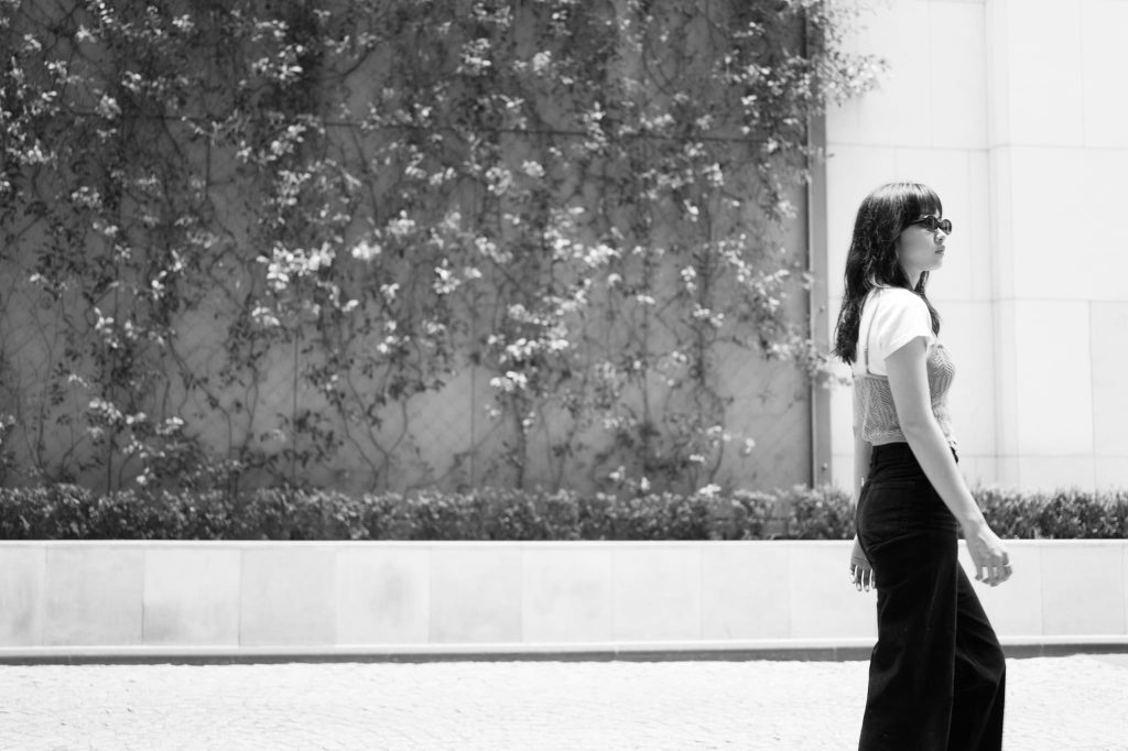 A models walk outside the entrance of the Westin Hotel Melbourne, captured with the Leica Q3 43, a work of passion by Arnold Szmerling for the Visual Life Collection focusing on lifestyle legacy portraiture.