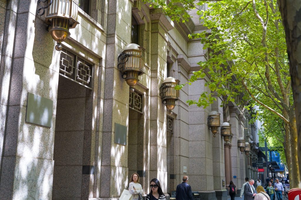 A closeup of the lower facade of 333 Collins Street Melbourne, a work of passion by Arnold Szmerling captured during his Leica Q3 street photography experience.
