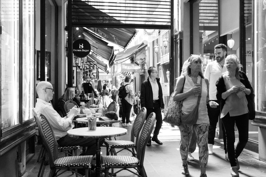 Dining and shopping in the Block Arcade alley precinct Melbourne, a work of passion by Arnold Szmerling captured in Black and White during his Leica Q3 street photography experience.