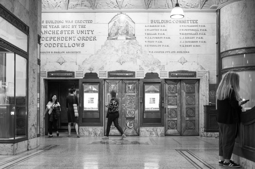 Inside the Manchester Building Melbourne , a work of passion by Arnold Szmerling captured in Black and White  during his Leica Q3 street photography experience.