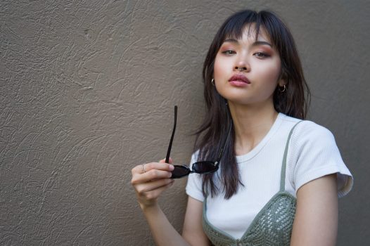 A cheeky gaze by Kobowonderland, captured with the Leica Q3 43, a work of passion by Arnold Szmerling for the Visual Life Collection focusing on lifestyle legacy portraiture.